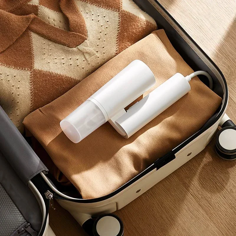 مكواة بخارية أصلية من شاومي مي - مراجعة Mini Iron Travel وسعره